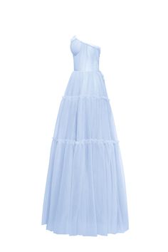 Dreamy tulle dress in light blue color with a light ruffled tulle maxi skirt. This dress has a heart-shaped boned semi-transparent bodice with built-in cups and a corset back, which makes the silhouette fitted and elegant. The A-line maxi skirt is made from multiple layers of delicate tulle that emphasize the hourglass silhouette. The waistline is adorned with a silver belt with Milla’s signature. Details: Material: Tulle Fabric composition: 100% Polyester, 100% Nylon Sleeve style: Sleeveless Silhouette: A-line Skirt length from waist: 116 cm / 45.6 inches Dress weight: 1.14 kg / 2.5 lbs Neckline: Heart-shaped neckline Back: Lacing closure Lining: Light blue full-length flared underskirt Model is: 180 cm / 83-60-95, wearing size S Art.N.: 9000-10 Light Blue Blue Organza Gown For Spring, Spring Tulle Gown With Sheer Bodice, Light Blue Tulle Dress For Evening, Summer Tulle Dress With Pleated Bodice, Spring Ball Gown Dress With Voluminous Skirt, Summer Dresses With Pleated Bodice And Tulle Material, Light Blue Tulle Dress For Prom Season, Light Blue Tulle Bridesmaid Dresses, Bridesmaid Tulle Evening Dress With Ruffles