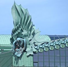 a building with a large dragon on the side