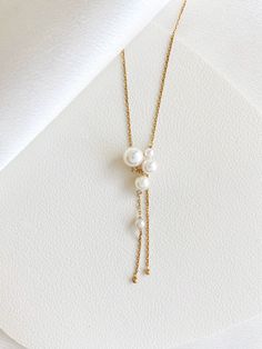 LONG LASTING AND DURABLE FREE SHIPPING ON ALL U.S ORDERS SAFE AND SECURE ONLINE SHOPPING MATERIALS: - 18k gold chain - Akoya pearls DETAILS: - Akoya pearls size: 3-7mm - Adjustable chain length: 16''-18'' - Pearl luster: superior - Pearl quality: minor blemish with at least 90%-95% surface clean - Pearl shape: perfectly round CARE INSTRUCTION: ***Gemstone and pearl are very fragile materials than others and need to be handled with care. As a general rule, if you're unsure about whether it's a go Unique Pearl Necklace, Pearl Cluster Necklace, 18k Gold Chain, Cluster Necklace, Pearl Cluster, Jewelry Charms, Funky Jewelry, Akoya Pearls, Jewellery Ideas