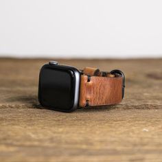 CONSTRUCTION• Handmade Apple watch band in Horween Leather: English Tan, Brown Nut, and Black Dublin• Simple stitching in black waxed polyester thread• Includes attached Apple watch adapters in black (Space Black) and polished silver (Stainless) • Brass PVD (matte black) buckle• Handmade in our North Carolina workshopSPECS • Available in 44mm/42mm and 40mm/38mm for Series1-6 Apple Watch• Sized to fit wrists 6.5" - 8.25"• For men or womenABOUT OUR PROCESSWe start with 5-5.5oz Horween leather and Adjustable Leather Watch Bands With Black Band, Adjustable Black Apple Watch Band For Everyday, Adjustable Black Band Apple Watch For Everyday, Adjustable Brown Watch With Black Band, Adjustable Apple Watch Band With Waxed Finish For Everyday, Adjustable Waxed Finish Apple Watch Band For Everyday Use, Apple Font, Simple Stitching, Leather Apple Watch Strap