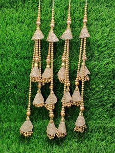 Indian Handmade Golden Beaded Lahenga Latkan Tassels for Saree HandBags Hangings Dupatta Bridal Wedding dress for Women pair of 2 pcs Size - 32 cm Length  Item Description You can use this Beautiful pair of tassle for several DIY projects.  *These beautiful Tassel Latkans are used as the accessory for Lahenga and saree , but u can use according to your need and your innovative ideas. * Package contains 2 Latkan / 1 Pair you can use these latkans in various ways Craft Projects Designing Home Decoration Festive celebrations. Evening and party Apparels. Home décor items Apparel & Fashion Scarves n Stoles Headband, hats Table cover, curtains, Pillow covers, Cushion cover Shoe designing Headband, hats Table cover, curtains Designing stylish blouses Ship From New Delhi, India 2 Latkan / 1 Pair Tassels For Saree, Latkan Tassels, Dupatta Bridal, Wedding Dress For Women, Stylish Blouses, Bridal Wedding Dress, Gold Blouse, Lehenga Blouse, Fashion Scarves