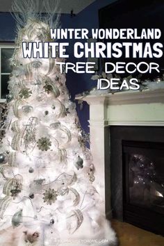 a white christmas tree decorated with ornaments in front of a fire place and the words winter wonderland white christmas tree decor ideas