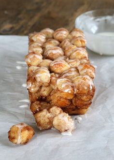 some kind of food sitting on top of a piece of paper