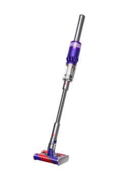 a purple and silver vacuum is on a white background with no one around it to see