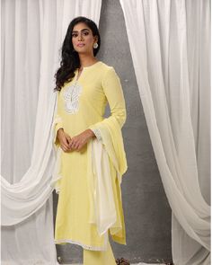 Description: Linen kurta paired with straight pants, both hemmed with ivory anchor embroidery. Enhanced with a statement neckline with anchor embroidery, it makes a truly mesmerising vision.Colour Yellow/PeachFabric LinenCare Dry Clean onlyFit Tailored Unstitched Anarkali Kurta With Embroidered Neckline, Long Sleeve Chanderi Kurta With Embroidered Neckline, Unstitched Straight Kurta Salwar Kameez With Embroidered Neckline, Unstitched Salwar Kameez With Embroidered Neckline, Summer Palazzo Set With Embroidered Border And Straight Kurta, Wedding Salwar Kameez With Embroidered Neckline And Straight Kurta, Elegant Cotton Sharara With Gota Work, Chanderi Kurta With Embroidered Neckline And Long Sleeves, Unstitched Kurta With Embroidered Neckline For Eid