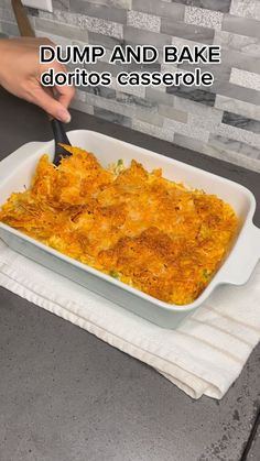 a casserole dish is being served on a white towel with the words dump and bake doritos casserole