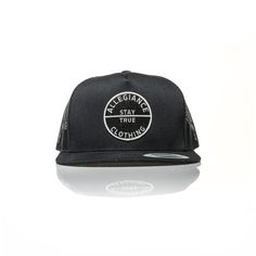 a black trucker hat with white lettering on it