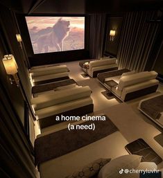 a movie room with couches and chairs in front of a screen that says, a home cinema fa need