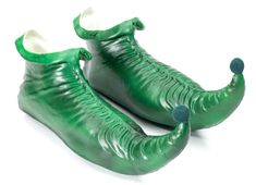 PRICES MAY VARY. Flexible slip-on costume footwear Curling toes and tip poms Waterproof pic One size fits most teens and adults Munchkin Costume, Leprechaun Costume, Heat Miser, Christmas Elf Costume, Green Elf, Green Costumes, Clown Shoes, Elf Shoes, Glass Slippers