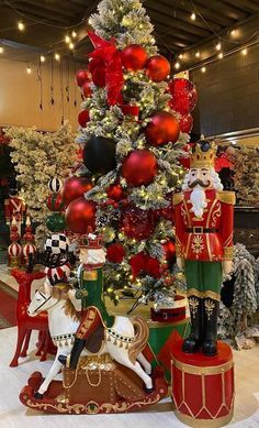 a christmas tree decorated with red and gold ornaments