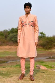 Peach kurta with cutdana embroidery in rose placement pattern. Paired with churidar. - Aza Fashions Embroidered Sets For Wedding And Eid, Traditional Peach Wear With Floral Embroidery, Traditional Festive Kurta With Embroidery, Festive Fitted Traditional Wear With Embroidery, Traditional Kurta With Embroidery For Eid, Traditional Kurta With Embroidery For Diwali, Traditional Embroidered Kurta For Eid, Traditional Embroidered Kurta For Diwali, Traditional Peach Dress With Floral Embroidery