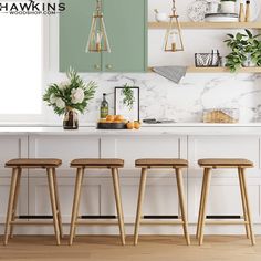 three stools in front of a kitchen island