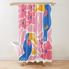 a colorful shower curtain with birds and flowers in pink, blue, yellow and white