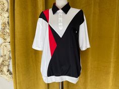 Awesome vintage bowling shirt from the 80s by ALAN STUART Mens size XL White polo-style bowling shirt with black collar & cool black & Red geometric shapes Excellent vintage condition with age-appropriate wear-please see all photos Retro Collared T-shirt For Streetwear, Retro Red Polo Collar Top, Retro Collared Polo Shirt With Graphic Print, Vintage Bowling Shirts, Tapestry Vest, Vintage Bowling, 1950s Mens, 80s Shirts, Glass Shoes