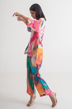 Multi-colored modal silk shirt with abstract print. Comes with pant. - Aza Fashions Multicolor Silk Sets With Vibrant Print, Summer Silk Printed Pants, Multicolor Straight Pants Sets For Summer, Multicolor Summer Sets With Straight Pants, Summer Multicolor Sets With Straight Pants, Multicolor Silk Sets For Summer, Multicolor Silk Summer Sets, Color Abstract, Collar Shirt