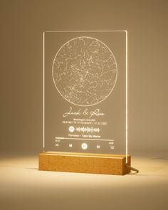 an illuminated glass plaque with a map on it