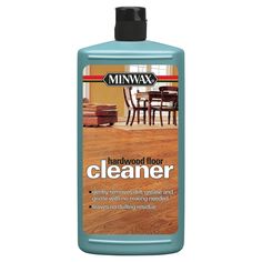 a bottle of wood floor cleaner on a white background