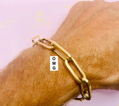 The Most Versatile & Fashionable Gold Bracelet You Will Ever Wear. Perfect On Its Own, As A Compliment To Other Gold or Diamond Bracelets Or Accented With Charms. Compare Our Link Size and Gold Weight To Anyone: Based on 7" Length La Petite 3.7mm wide x 12mm long (1/8" x 5/8") 2.6 Grams. Classic 5.3mm wide x 16mm long (1/4" x 1/2") 3.1 Grams. Grande 5.8mm wide x 21mm long (5/16" x 3/4") 4.5 Grams. OMG 9.0mm wide x 22mm long (3/8" x 7/8") 7..5 Grams AVAILABLE IN 14KT YELLOW & WHITE GOLD AVAILABLE IN VARIOUS SIZES IN STANDARD & CUSTOM LENGTHS. Contact Us For Custom Lengths and Pricing. UNIQUE LOBSTER CLASP ALLOWS YOU TO CUSTOMIZE THE LENGTH TO FIT THE DAYS WARDROBE. THE MATCHING NECKLACE MAKES A PERFECT COMBINATION 🔹FREE PRIORITY SHIPPING 🛩 Ready to Ship In 3 to 5 Days. RUSH ORDERS AVAILAB Rectangular Gold Bracelet With 17 Jewels, Gold Bracelets With Rectangular Links And Polished Finish, Gold Bracelets With Polished Rectangular Links, Gold Bracelet With Solid Link Construction For Anniversary, Anniversary Gold Bracelet With Solid Link Construction, Gold Brass Bracelets For Anniversary, Gold Rectangular Bracelet With Polished Finish, Gold Brass Bracelet For Anniversary, Rectangular Gold Bracelet With Polished Finish