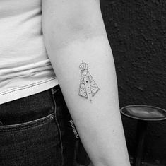 a person with a tattoo on their arm