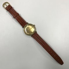 "PLEASE READ ENTIRE DESCRIPTION BEFORE PURCHASING d141 Vintage Original Lucien Piccard Swiss 14K Gold Mechanical Wrist Watch Pre-owned: Some scratches from normal wear, appropriate to its age. Face shows some discoloration. Please see photos for details. Watch is working and keeping time well.Watch is in good mechanical condition, all of our watches are tested for time by one of our watchmakers before being listed for sale. Sold as is, as shown on pictures. Specifics: *Lucien Piccard *Mechanical Gold Business Watch With Bracelet Strap, Classic Formal Watch With Bracelet Strap, Classic Bracelet Strap Watch Band For Anniversary, Formal Watches With Bracelet Strap, Formal Brown Watches With Bracelet Strap, Brown Formal Watches With Bracelet Strap, Bulova Accutron, Mechanical Hand, Authentic Watches