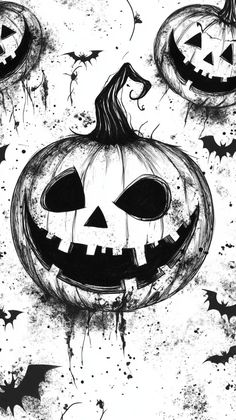 black and white drawing of jack o lantern pumpkins