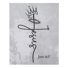 a cross with a crown on it and the word jesus written in cursive writing