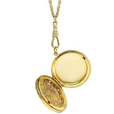 Classic and ornate in design, this necklace features a Cameo depicting a Victorian Women, surrounded by an ornate locket, which dangles on a medium rope chain. Available in silver tone and 14K gold dipped Measurements: 30"L x 1.54"W x 3.03"H Made In USA 1928 JEWELRY COLLECTION From the vaults of rich European capitals to the antique laden attics of old American estates, 1928 Jewelry has created modern replicas of the most beautiful, exquisite vintage jewelry ever made. For those who love all thi Formal Engraved Medallion Necklace, Engraved Medallion Necklace For Formal Occasions, Ornate Medallion Locket Necklace With Intricate Design, Victorian Style Medallion Locket Necklace With Filigree, Antique Round Pendant Locket Necklace With Intricate Design, Formal Medallion Charms Jewelry, Formal Medallion Charm Necklaces, Ornate Round Pendant Locket Necklace For Formal Occasions, Ornate Medallion Jewelry With Coin Pendant