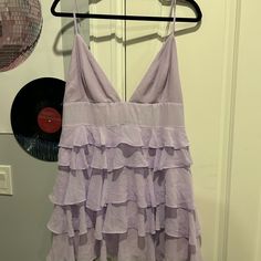 Brand New Nbd Ruffle Mini Dress. Super Cute And Sold Out On Revolve Purple Ruffled Mini Dress For Date Night, Purple Flowy Mini Dress For Party, Flowy Purple Mini Dress For Party, Purple Mini Dress With Ruffles, Purple Tiered Mini Dress With Ruffles, Purple Ruffle Hem Dress For Date Night, Chic Purple Tiered Mini Dress, Chic Tiered Purple Mini Dress, Purple V-neck Ruffled Mini Dress