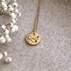 Sun and Moon Coin Necklace Decorated with Zircon  Plated 18K Gold Vermeil ☾ ﾟ｡⋆ Details ⋆｡ ﾟ☾ Charm diameter: 2.5cm. Chain size: 40cm + 5cm Our sun and moon necklace has colorful cubic zirconium crystals and an embossed hammer finish. Our unique design is sure to accentuate your personal style.  ☾ ﾟ｡⋆ How to care for your jewellery ⋆｡ ﾟ☾ Although our jewellery is made of high quality alloy with 18k gold plated materials made to last, to ensure longevity we recommend the following care tips: ● Av Power Of Attraction, Sun And Moon Necklace, Coin Necklace, Moon Pendant, Moon Necklace, The Pouch, Coin, Gold Vermeil, Sun