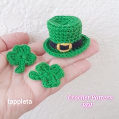 small crocheted green hat and shamrocks for st patrick's day