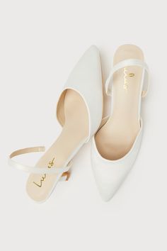 Your favorite going-out heels just dropped, and the Lulus Leith White Satin Kitten Heel Slingback Pumps are ready to get the party started whenever you are! Keep things ultra-chic with these sleek satin pumps that feature a single sole silhouette, a classy pointed-toe upper with a low-cut collar, and a slender slingback strap (with a bit of elastic at the side for fit). A trendy kitten heel completes the iconic design. 2. 5" wrapped kitten heel. Cushioned insole. Felted rubber sole has nonskid m Low Heel Slingback Pumps With Wrapped Heel For Party, Chic Slingback Kitten Heels For Wedding, Chic Wedding Slingback Kitten Heels, Chic Low Heel Slingback Sandals For Wedding, Spring Event Slingback Pumps With Open Heel, Chic Slingback Pumps With 4-inch Heel For Events, Slingback Pumps With Heel And Ankle Straps For Events, Chic Slingback Sandals For Wedding, Chic Low Heel Slingback Pumps For Wedding