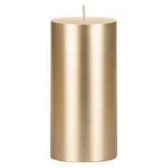 a gold cylindrical candle holder on a white background, with a single lit candle in the middle