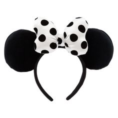 a minnie mouse ears headband with black and white polka dots