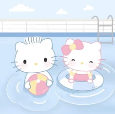 two hello kitty dolls are in the water