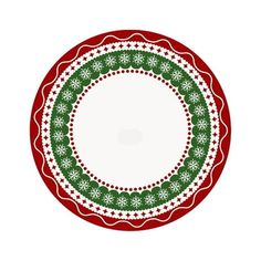 a red and green plate with snowflakes on the rim, in front of a white background