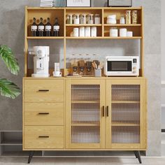 a wooden cabinet with glass doors and shelves filled with bottles, cups, and other items