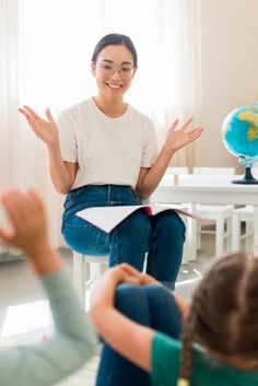 Teacher asking questions for her students Teacher Photo Pictures, Teacher With Students Photography, School Teacher Photo, Kindergarten Photography, Teacher Photography, Portrait Photography Editing, Teacher Portrait, Teacher Reference, Childcare Teacher