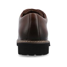 Introducing the Martin plain toe derby by Vance Co. These professional-style shoes are crafted with premium vegan leather, offering a sleek and business-savvy look. Featuring a 12 mm Tru Comfort Foam™ insole and a lace-up design, they provide all-day comfort and a secure fit. With a 1-1/4 inch block heel, round-toe shape, and padded tongue for extra comfort, the Martin derby combines professional style with maximum comfort, making it an ideal choice for the office or any occasion. Brown Faux Leather Business Oxfords, Brown Faux Leather Oxfords For Business, Cushioned Leather Shoes For Business Casual, Oxford Moc Toe Work Shoes, Brown Faux Leather Oxfords For Formal Occasions, Formal Brown Faux Leather Oxfords, Classic Synthetic Dress Shoes For Workwear, Slip-resistant Round Toe Dress Shoes For Work, Classic Synthetic Dress Shoes For Work