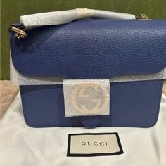 Authentic Beautiful Gucci Crossbody Bag New Condition And Great For Every Occasion Gucci Dollar Calfskin Interlocking G Caspian Crossbody /Shoulder Bag Nice Gold Interlocking G Logo, Caspian Blue, Grained Calfskin Leather, And Gold Chain With Leather Shoulder Pad. Style Number: 510304 Cao0g /4231 Unused, Nwt, Dust Bag And Gift Box. Details Width 6.25 In Height 7.75 In Depth 2.5 In Blue Rectangular Gucci Bag, Blue Gucci Shoulder Bag With Branded Hardware, Blue Gucci Shoulder Bag With Detachable Strap, Blue Gucci Crossbody Shoulder Bag, Gucci Blue Shoulder Bag With Detachable Strap, Blue Gucci Shoulder Bag For Formal Occasions, Formal Blue Gucci Shoulder Bag, Blue Gucci Shoulder Bag For Evening, Blue Gucci Evening Shoulder Bag