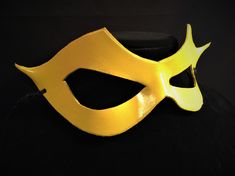 DESCRIPTIONSpeed around town in a yellow mask for supervillian Professor Zoom, Reverse Flash! Great for Halloween or Marvel Firestar at Comicon. **We also sell this mask with a red lightning bolt!** Or, perhaps you need a plain yellow mask for Masquerade Ball. Get this style in any color. Waterproofed leather, glossy or matte finish, & several choices to affix the mask (cord, elastic, ribbon, waterproof cord, stick, or no holes for adhesive). Measurements: 3.25" high x 10.5" wide (tallest &a Superhero Masquerade Mask, Superhero Style Masquerade Masks For Halloween, Superhero Masks For Halloween Masquerade, Mask For Masquerade Ball, The Reverse Flash, Professor Zoom, Mask For Masquerade, Flash Superhero, New Years Eve Ball