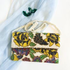 Yellow on White Floral Beaded Clutch   Handbag Size: 10x6 inches One Pocket Magnetic Snap Closure Zipper To Open The Clutch Back And Front Fully Beaded Work Fabric Silk Beaded Chain Rectangular Cream Evening Bag As Gift, Rectangular Cream Evening Bag Gift, Cream Rectangular Clutch For Gift, Handmade Multicolor Clutch For Wedding, Handmade White Clutch For Gift, White Handmade Clutch For Gift, Handmade White Clutch As Gift, Handmade Cream Evening Bag For Gift, Handmade Cream Evening Bag As Gift