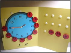 an open card with a clock on the inside and numbers around it that say telling time activity - so smart