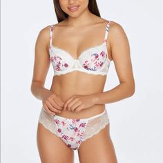 Elevate Your Lingerie Game With This Stunning Bendon Lingerie Padded Lace Floral Push Up Balconette Ra Lace Amour For Fredericks Of Hollywood. The Beautiful Multicolor Floral Pattern Adds A Touch Of Femininity To This Stylish And Comfortable Bra. The Lace-Up Closure Ensures A Secure And Customized Fit, While The Padded Cups Provide Ample Support For All-Day Comfort. This Bra Is Perfect For Any Occasion And Will Make You Feel Confident And Beautiful. The Balconette Style Is Perfect For Pairing Wi White Feminine Bra With Lace Trim, Feminine White Bra For Daywear, Feminine White Bra, White Feminine Daywear Bra, White Feminine Bra With Delicate Lace, White Full Cup Bra With Lined Body, White Underwire Bra For Daywear, White Delicate Lace Push-up Bra, White Full Cup Bra For Daywear