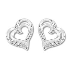 These wonderful heart earrings for her are accented with twinkling round diamonds. The sterling silver earrings secure with friction backs. Silver Double Heart Fine Jewelry Earrings, Silver Heart Earrings For Valentine's Day, Classic Heart Earrings With Diamond Accents For Anniversary, Diamond Open Heart Earrings For Anniversary, Anniversary Double Heart Earrings With Diamond Accents, Silver Open Heart Cubic Zirconia Earrings, Anniversary Heart Earrings With Diamond Accents, Classic Silver Heart-shaped Diamond Earrings, Heart-shaped Diamond Earrings With Accents For Anniversary