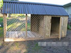 a dog house made out of wood and metal