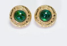 Christian Dior Glass Earrings. Vintage Christian DIOR green cabochon glass earrings in very good condition. Collectors item! Approximate Measurements: Diameter 1.2” Elegant Green Cabochons For Formal Occasion, Green Clip-on Earrings For Formal Occasions, Green Clip-on Formal Earrings, Vintage Green Jeweled Earrings, Elegant Green Round Clip-on Earrings, Elegant Green Cabochon Earrings, Green Round Cabochon Earrings, Luxury Green Vintage Earrings, Green Cabochon Round Earrings