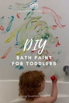 a little boy playing in a bathtub with the words diy bath paint for toddlers