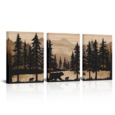 three pieces of wood with trees and mountains in the background, one has a bear on it