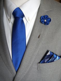 Handmade Blue Lapel Flower paired with matching Blue Tie and Blue Patchwork Pocket Square/ Men's Suit Accessories / Wedding accessories by Tripp2TrippDesigns on Etsy Cheap Men's Suit Accessories With Pocket Square, Lapel Flowers, Mens Suit Accessories, Silver Jumpsuits, Flower Lapel, Tie Matching, Flower Lapel Pin, Lapel Flower, Formal Mens Fashion