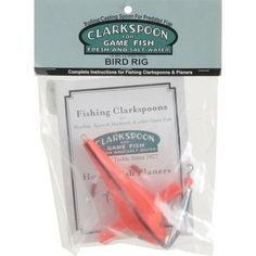 a red bird toy in its package on a white background with the label for clarkspon game fish